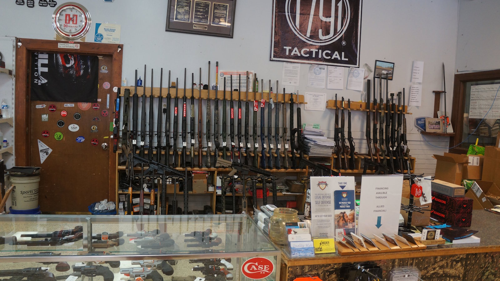 Behind the main counter at Foothills Firearm Factory gun shop in Marion NC