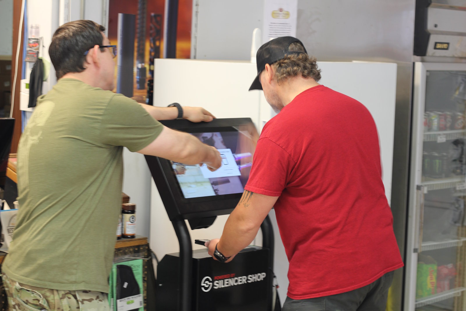Drew helping customer at Silencer Shop kiosk in Marion NC